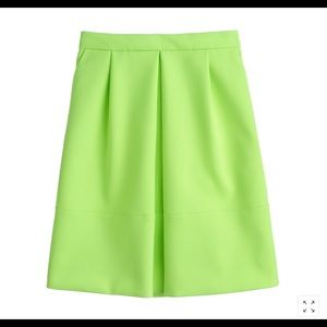 Neon yellow pleat from mini skirt